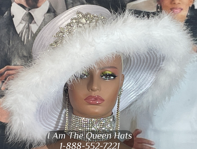 Image of a church hat by I AM the Queen Church Hats, adorned with feathered trim around the brim, radiating timeless elegance and beauty."

